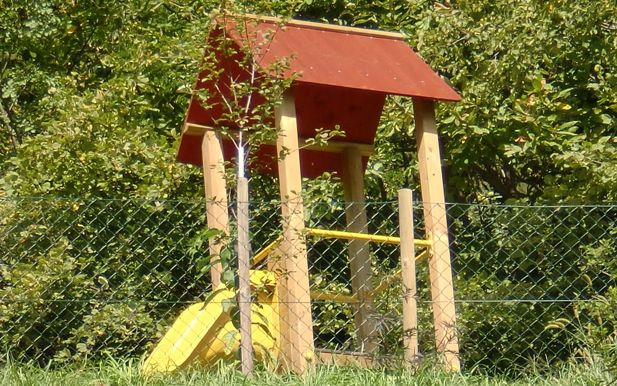 Children's playground with slide Family holiday Dorf Tirol Residence Lechner